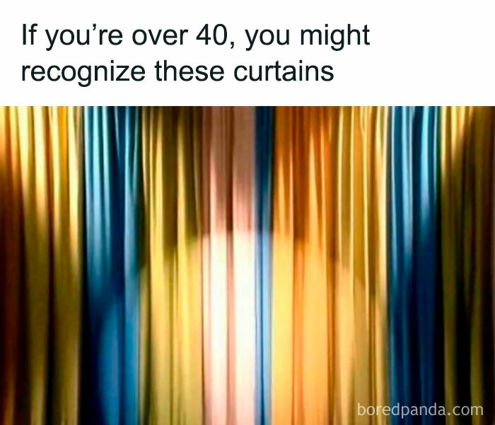 Colorful vintage curtains under a spotlight, evoking nostalgia.