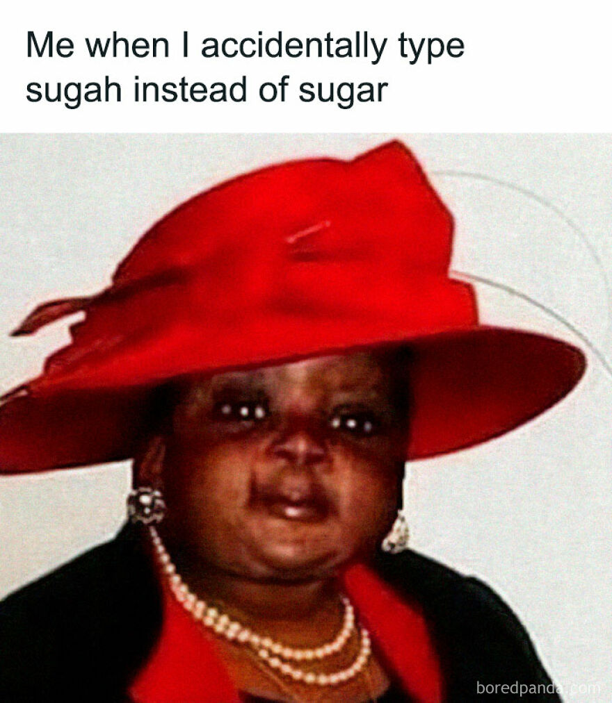 Woman in a large red hat and pearls with a humorous expression, relating to 'girl posts' meme about typing errors.