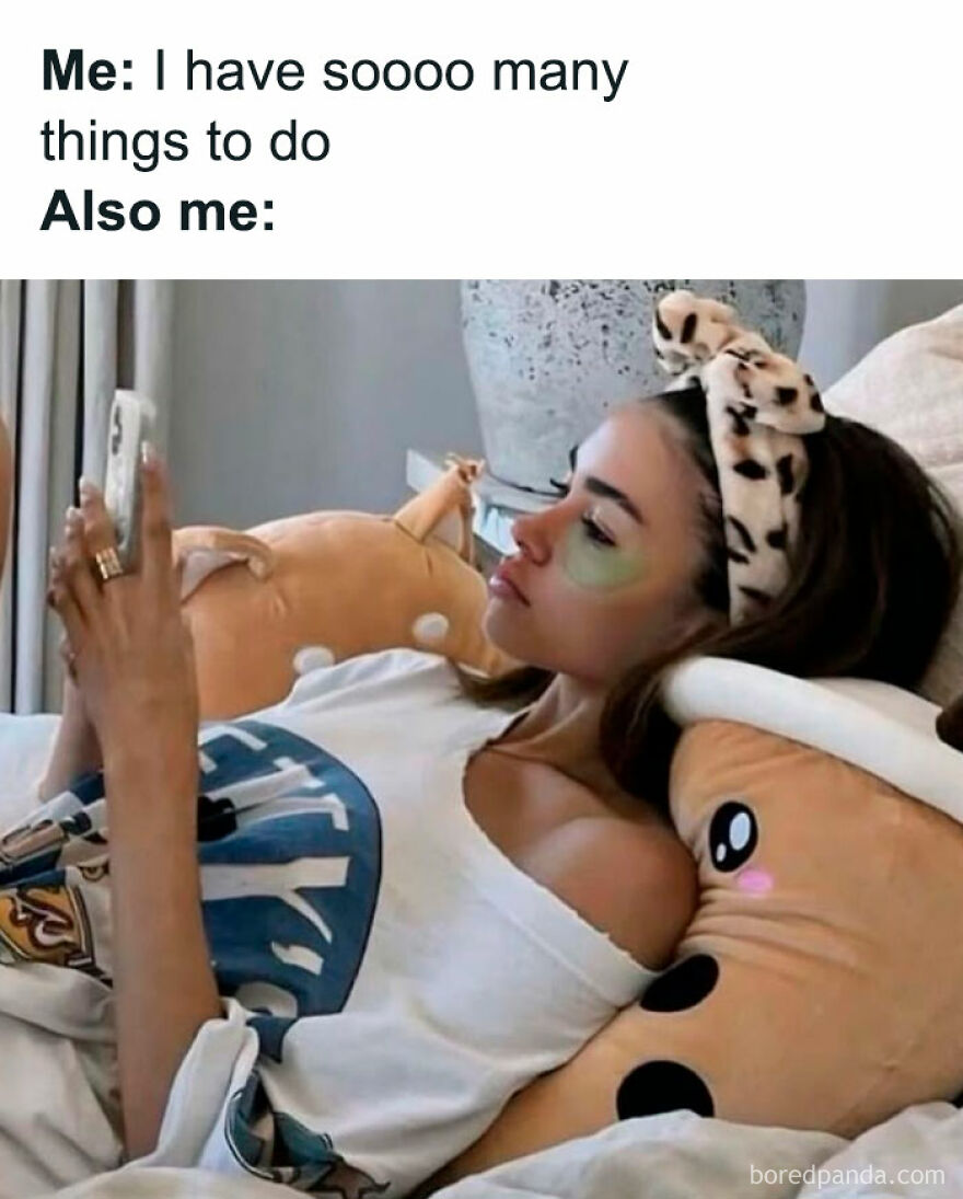 Girl relaxing in bed with phone, surrounded by plushies, representing relatable procrastination meme humor.