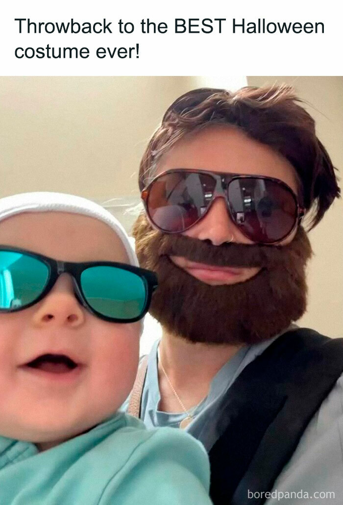 Baby and adult in funny Halloween costumes, both wearing sunglasses.