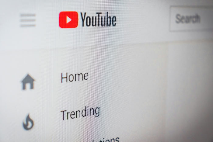 YouTube homepage showing navigation menu for internet hacks and trending videos.