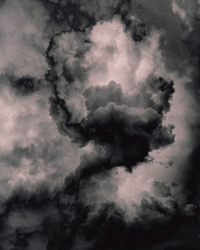 Dark, moody clouds epitomize dreamy escapism photography.