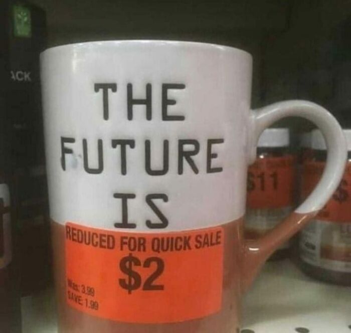 Mug with "THE FUTURE IS" text and a $2 sale sticker, showcasing a humorous meme.
