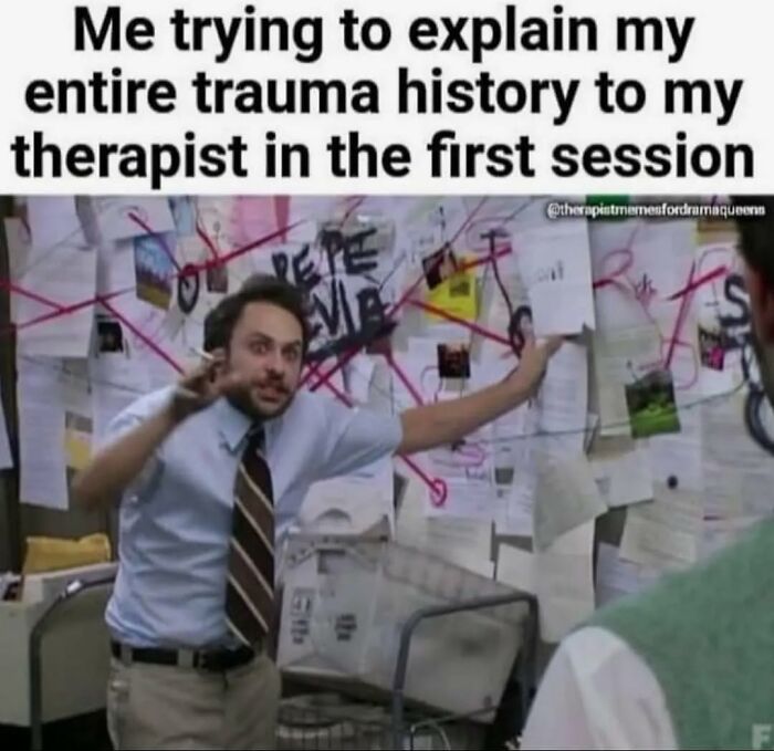 Man gesturing wildly in front of a conspiracy board, depicting an unhinged and relatable meme.