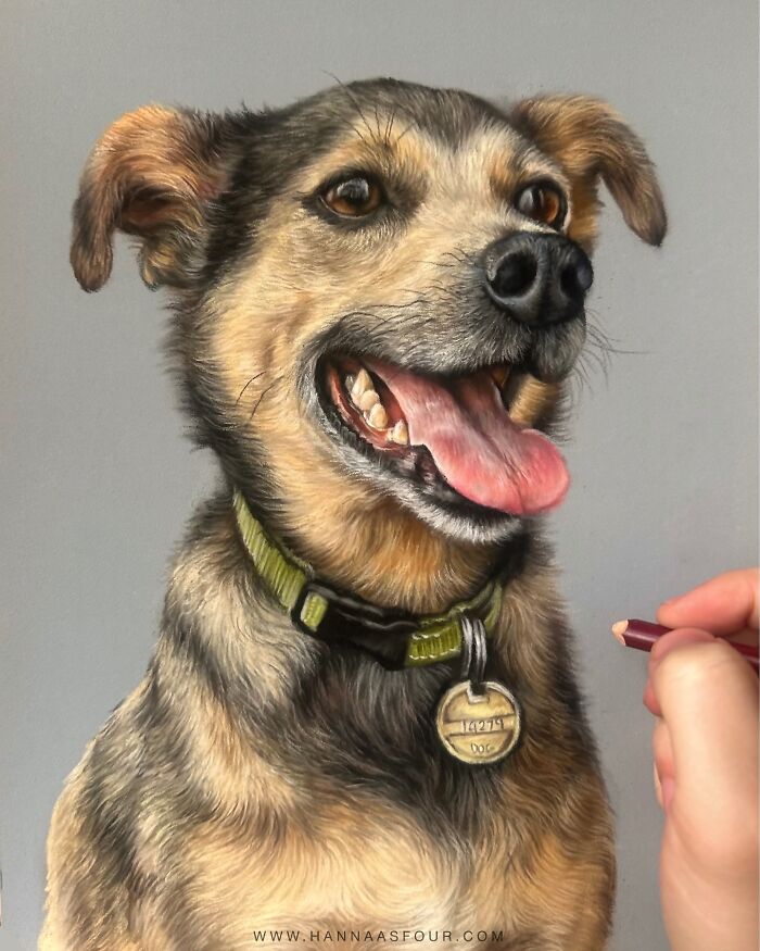 A realistic pencil portrait of a happy dog, showing incredible detail, with an artist's hand adding final touches.