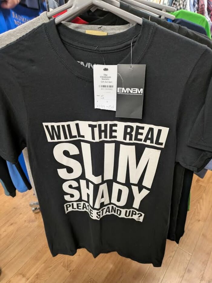 A T-shirt featuring "Will the real Slim Shady please stand up?" found in a secondhand shop.