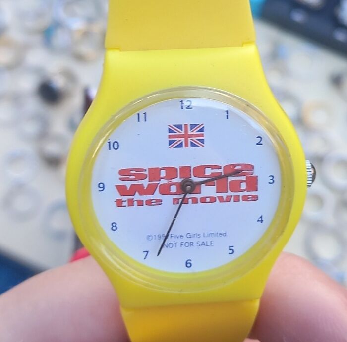 Bright yellow "Spice World" watch found in a secondhand shop, featuring a Union Jack design.