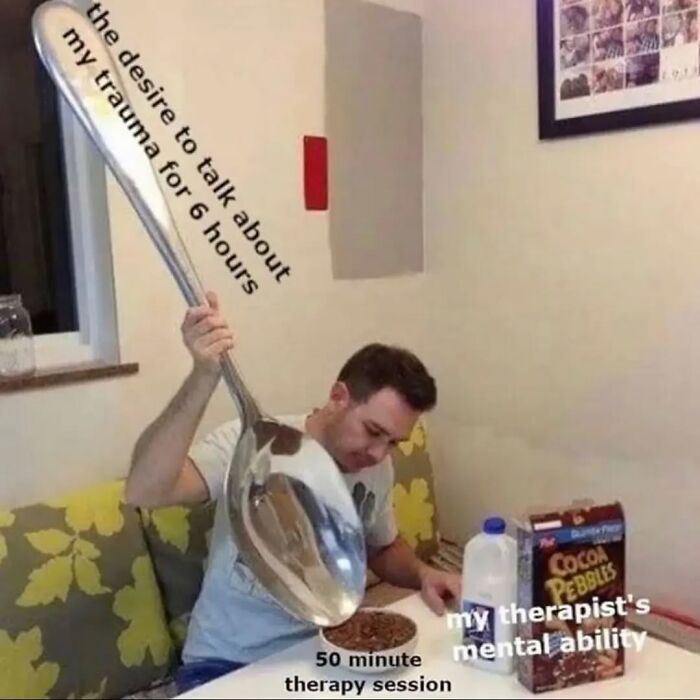 Man with giant spoon represents intense desire to share trauma in a relatable meme setting.