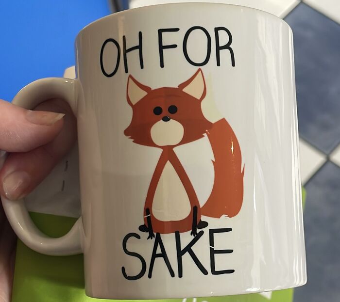Funny mug with a fox illustration and humorous text, a bizarre treasure found in a secondhand shop.