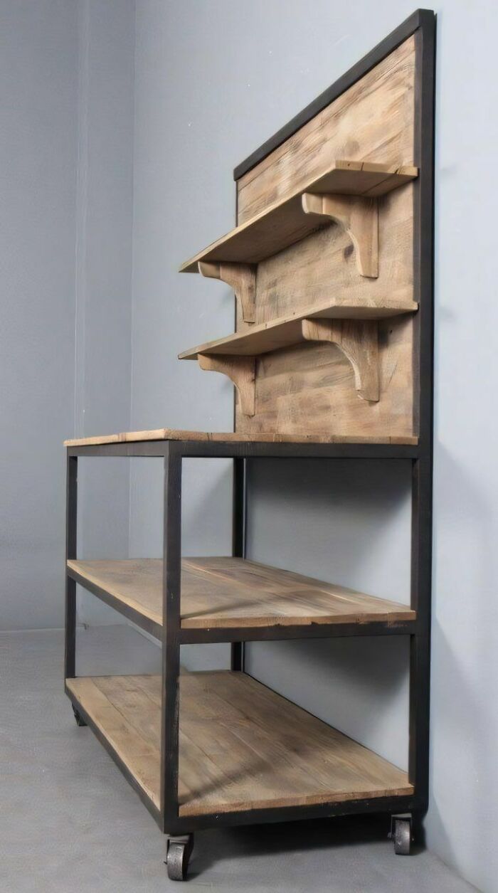 Woodworking ideas shelving unit with rustic wooden shelves and black metal frame on caster wheels in a modern space.