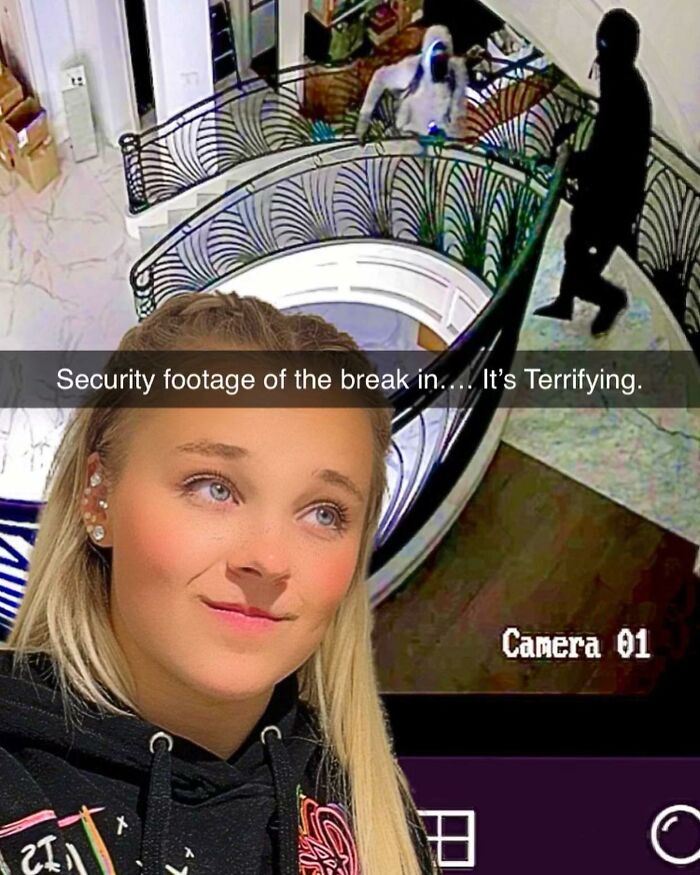 Surveillance image showing a break-in at a celebrity home with intruders on stairway inside the house.