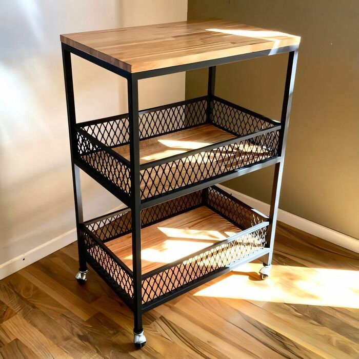 Metal frame cart with wooden shelves and top, showcasing woodworking ideas in a modern, functional design on wheels.