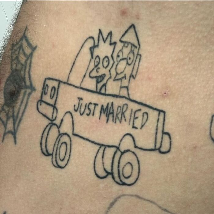 Simpsons tattoo featuring characters in a "Just Married" car design.