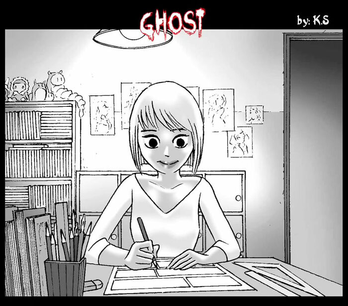 Comic artist drawing in a dimly lit room, creating chilling horror stories for DarkBox Comics.