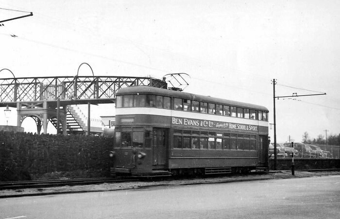 Historic black and white photo of a European tram in operation, illustrating life in Europe 100 years ago.