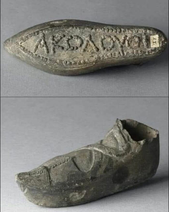 Ancient lead shoe artifact with inscriptions, showcasing unique details from archaeology news and architecture findings.