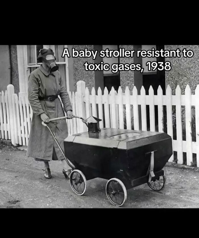 Person wearing gas mask pushing 1938 baby stroller resistant to toxic gases in spooky facts about our world context.