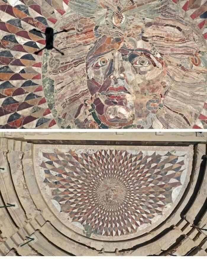Ancient mosaic featuring a detailed face and geometric patterns, showcasing stunning archaeology and architectural design.