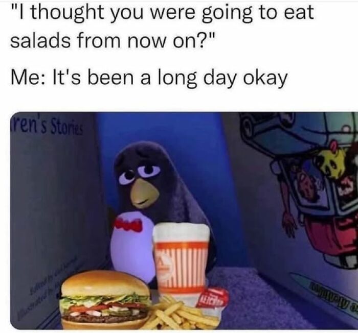 Penguin looking tired with fast food meal, paired with text about giving up salads, meme from daily laughs collection.