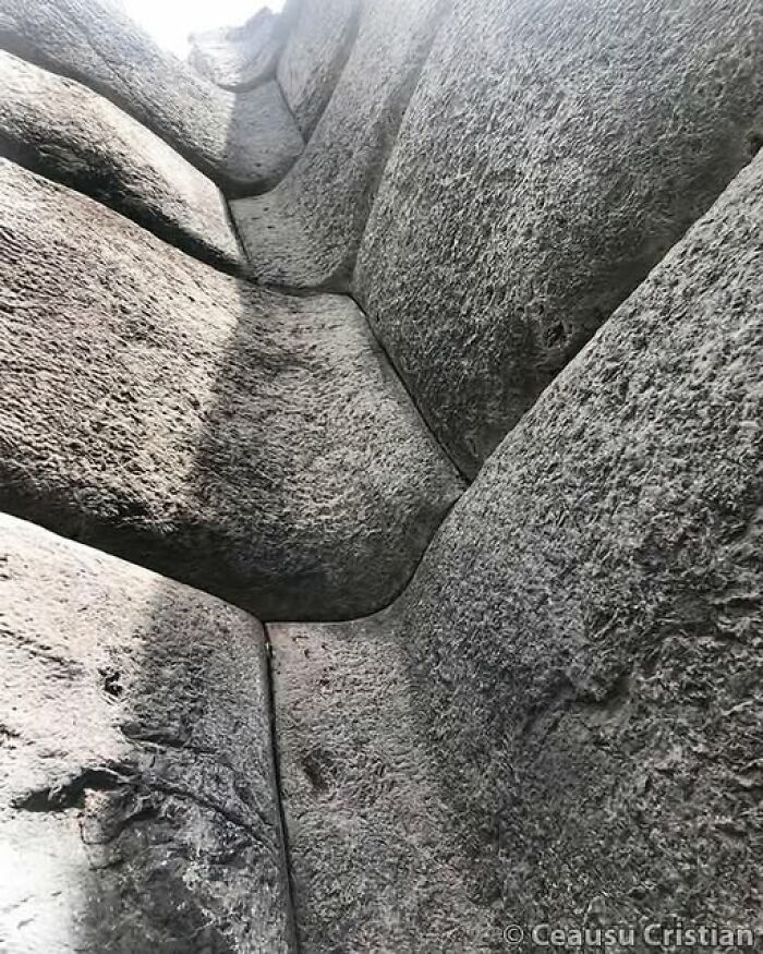 Close-up view of ancient stone blocks with tight joints showcasing archaeology news and architecture details.