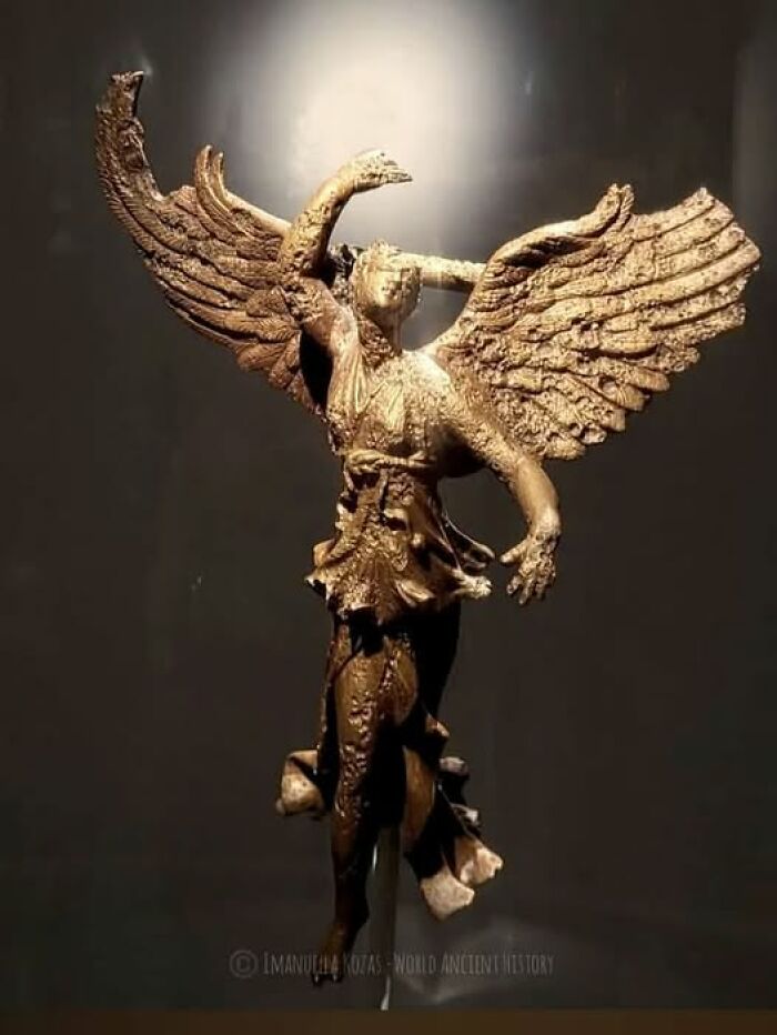 Bronze winged figure statue from ancient archaeology news showcasing detailed craftsmanship and historical architecture artistry.