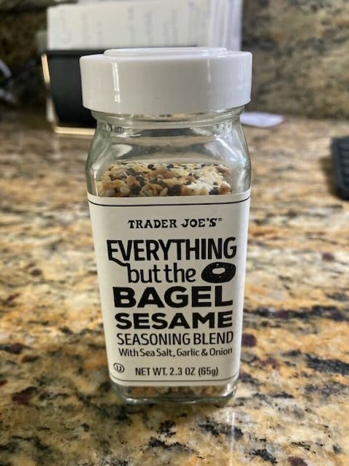 Trader Joe's Everything But the Bagel seasoning jar on a kitchen counter.