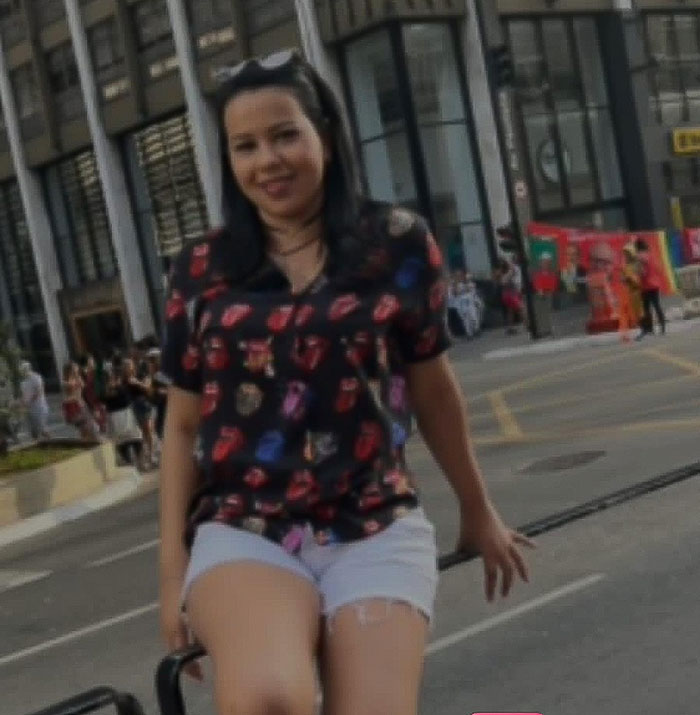 Woman posing outdoors in a city; context relates to transplants. Woman posing outdoors in a city; context relates to transplants.