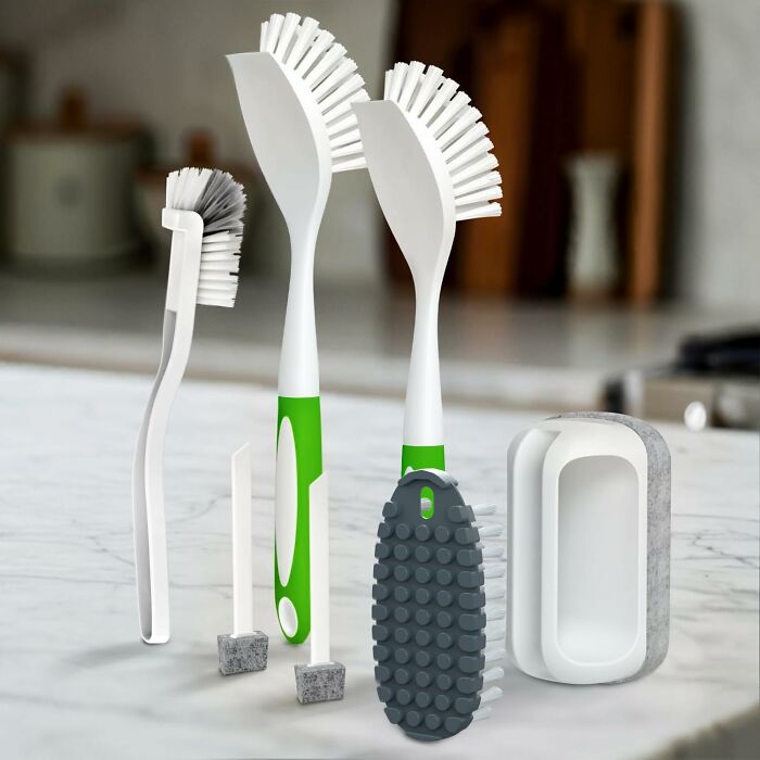 Set of versatile white and green cleaning brushes and scrubbers featured in popular Amazon haul finds for home cleaning essentials.