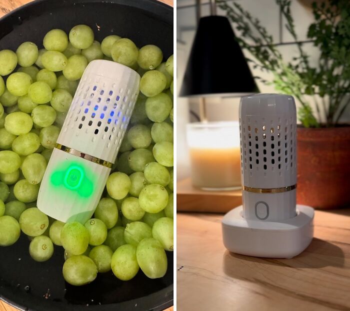 Gadget simplifying cleaning amid grapes and on a wooden table, part of products easing chores.