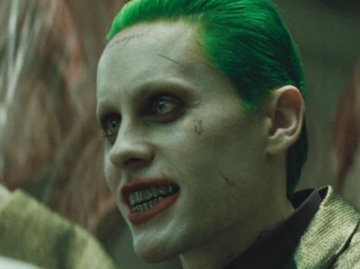 Actor with green hair and tattoos portraying a controversial Hollywood casting choice.