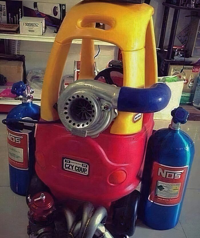 Toy car modified with turbo and NOS bottles, showcasing creativity from IG page's hardest posts.