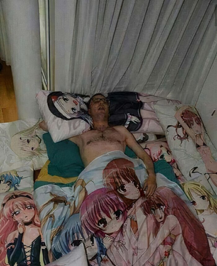 Man sleeping surrounded by anime-themed bedding, showcasing unique posts from this IG page.