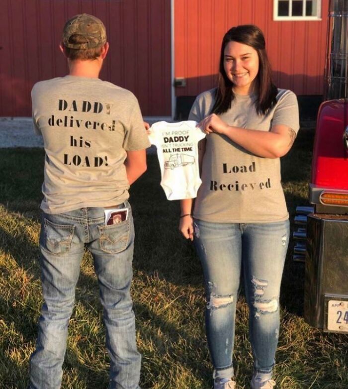 Two people wearing humorous custom shirts, with an infant onesie referencing dad's trucking, embodying cringe behavior.