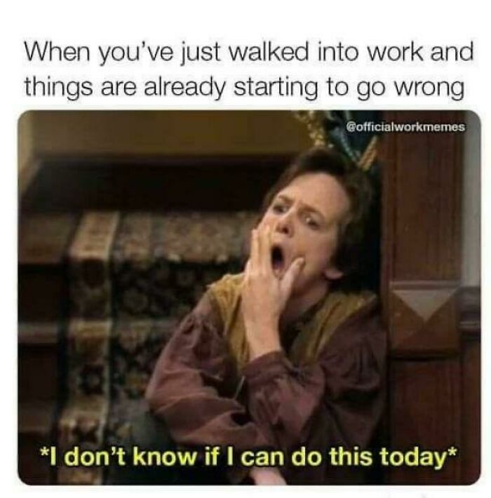 Person looking stressed at work, yawning, captioned with work meme text about a difficult day.