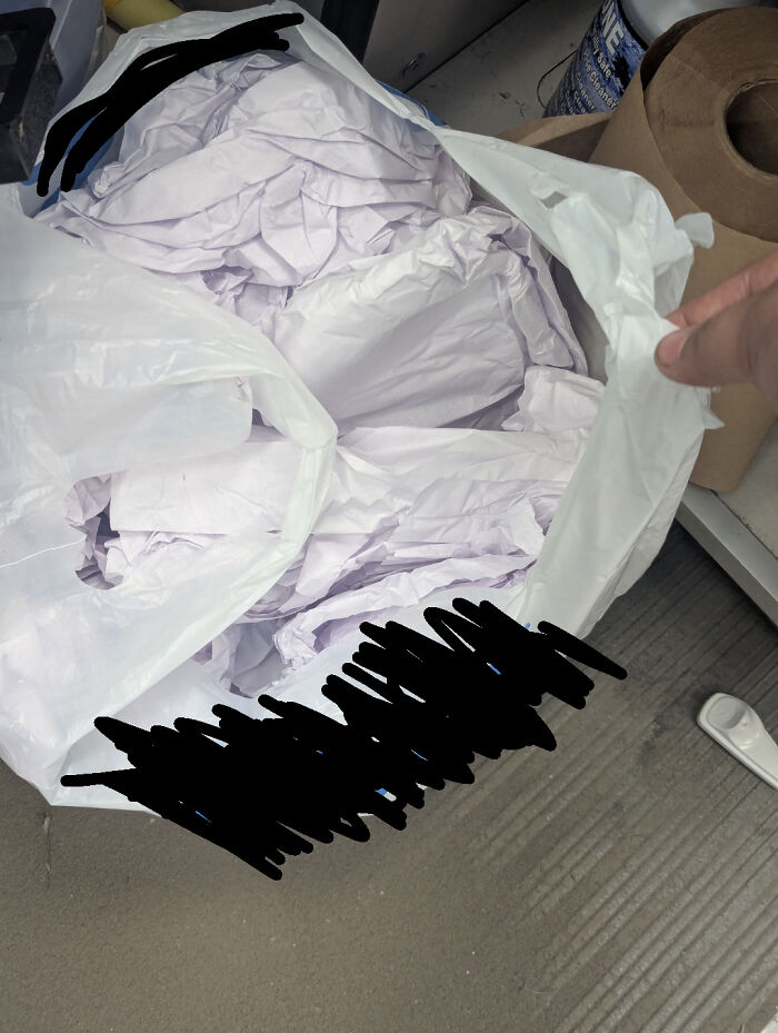 A bag filled with crumpled white paper, highlighting lack of self-awareness.