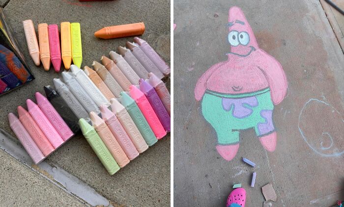 Colorful chalk drawing of a cartoon character on a sidewalk, next to a set of jumbo chalk pieces.
