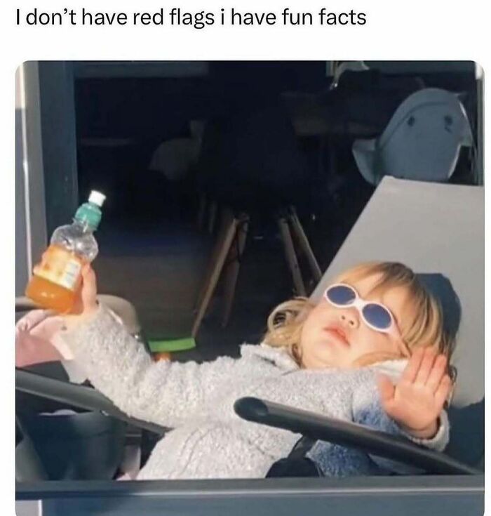Toddler lounging in a chair with sunglasses and juice, embodying relatable meme humor.