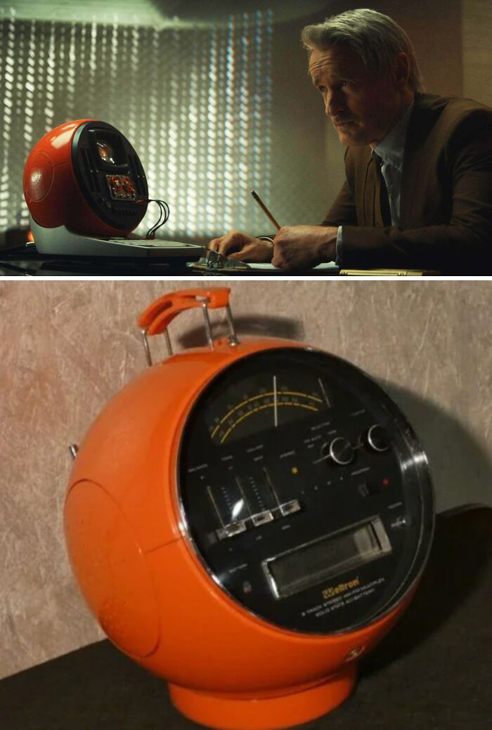 A filmmaker uses a retro orange spherical prop with gauges creatively in a movie scene.