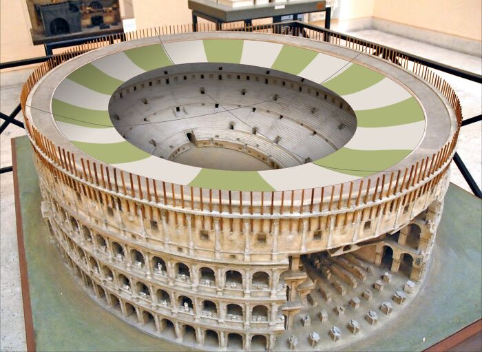 Ancient artifact model of the Colosseum with a modern interpretation of its awning structure.