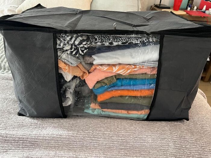 Storage bag with folded clothes, showcasing one of Amazon's movers and shakers products.