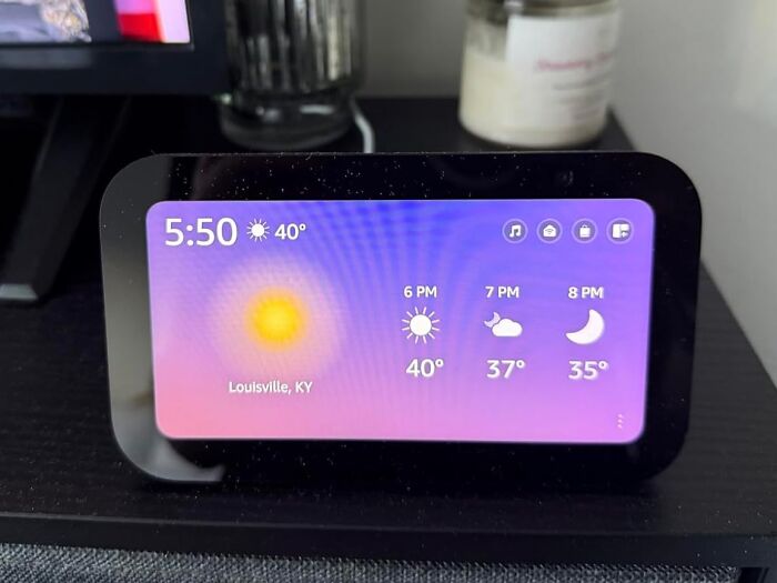 Smart display showing weather forecast for Louisville, KY, part of 40K Amazon Review Club recommended products.