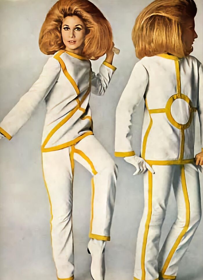 Retro hairstyle with voluminous hair and a bold outfit, showcasing amazing fashion from yesteryear.