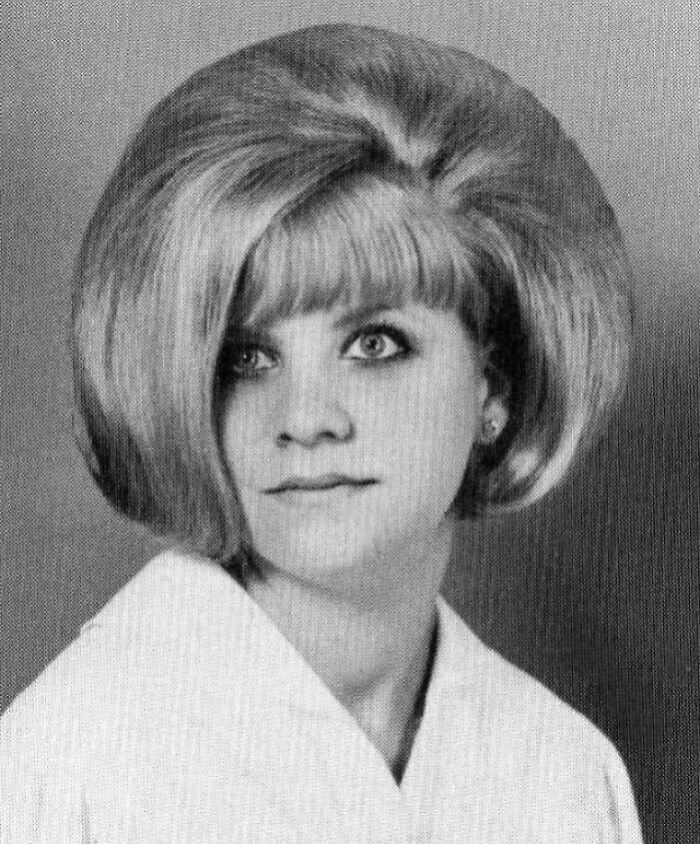 Vintage hairstyle featuring a voluminous beehive look, showcasing the unique fashion trends of yesteryear.