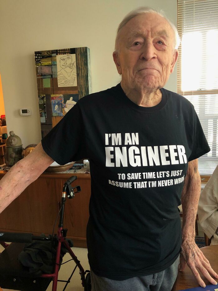 Elderly person wearing a humorous engineer t-shirt, embodying the funny spirit of senior citizens.