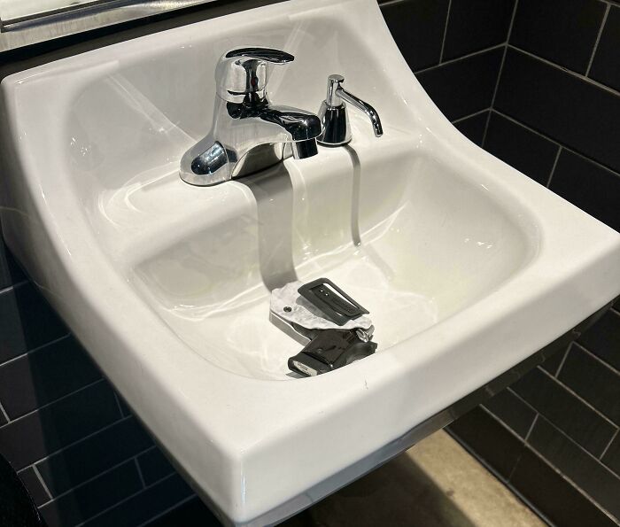 Sink with a stapler inside, illustrating someone's frustration shared online.