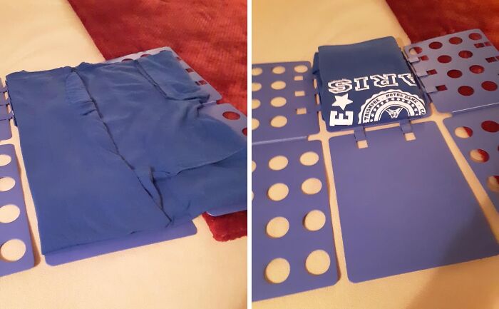 Clothes folding board on a bed, perfect for solo living essentials and organizing laundry efficiently.