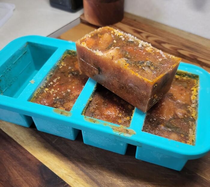 Frozen stew cubes in a blue tray, ideal for solo living meal prep and backup.