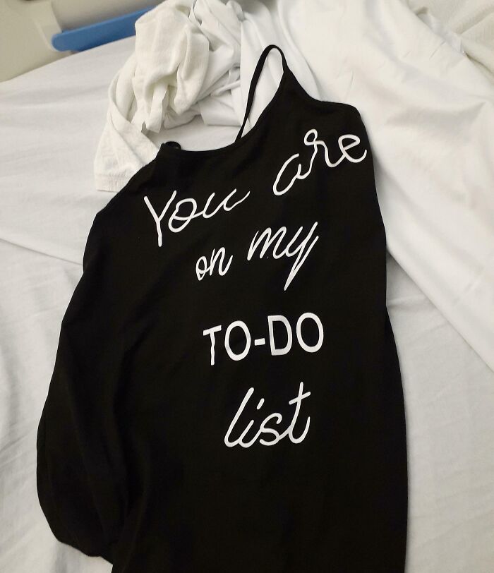 Black dress with playful slogan "You are on my to-do list", humor that keeps life interesting with partners.