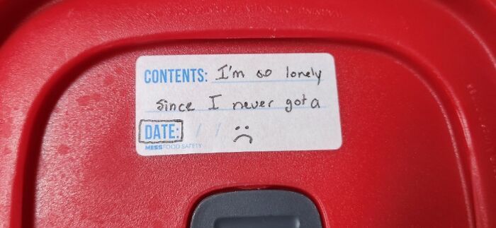 Humorous container label joke on a red lid, illustrating funny men ensuring life is never boring.