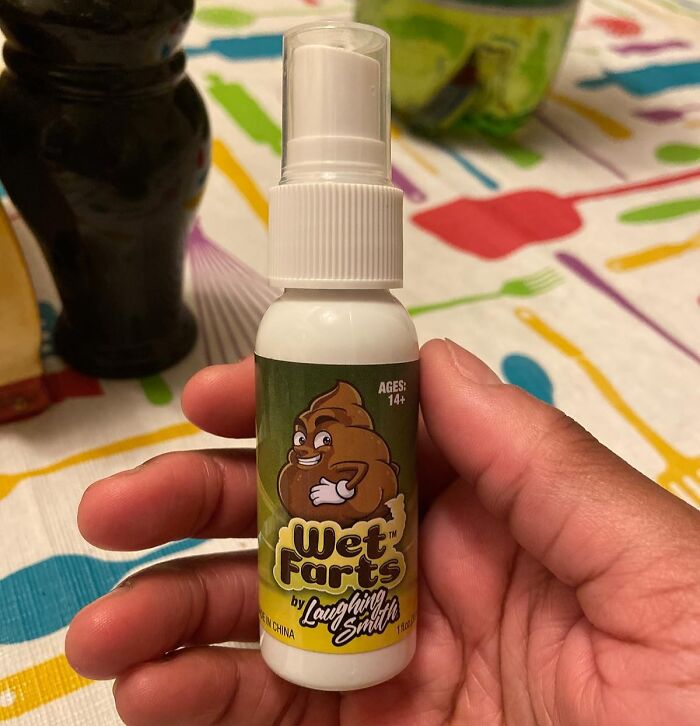 Hand holding a "Wet Farts" novelty spray bottle, perfect for the "weird friend."